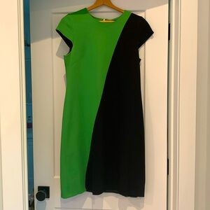Green/black color block dress. Sleeveless.